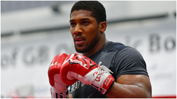 Anthony Joshua has announced he will return to the ring in December