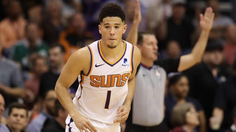 Phoenix Suns' Devin Booker to Be Sidelined for at Least One Week After Ankle Injury