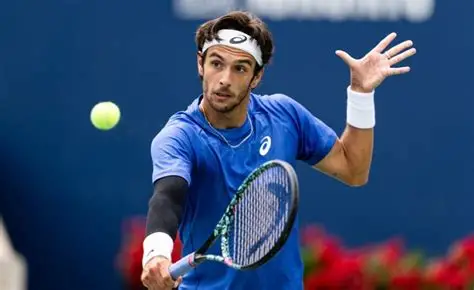 Novak Djokovic Advances After Musetti Retires from Injury