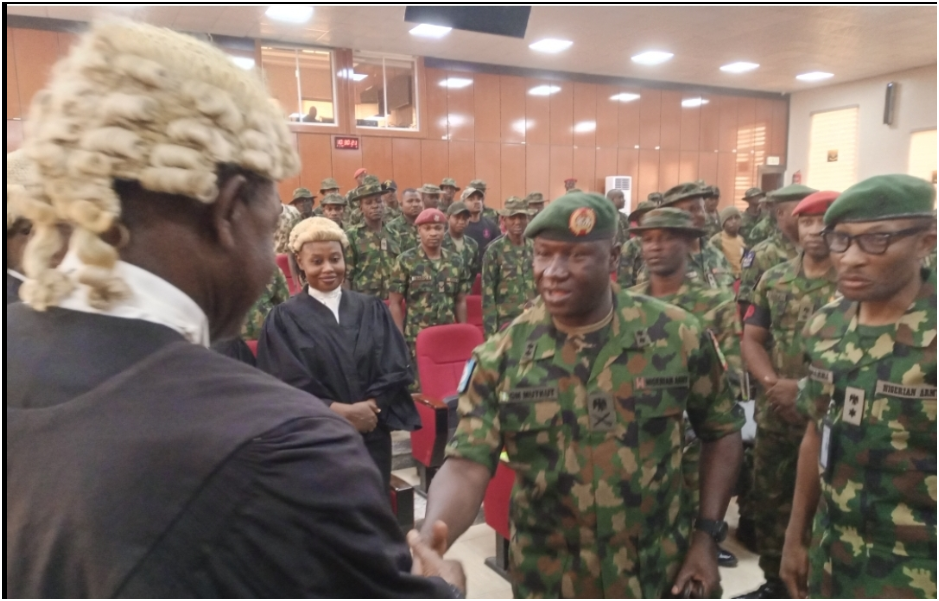 Military arraignment in national security cases ≠ guilt.