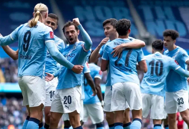 Manchester City go top